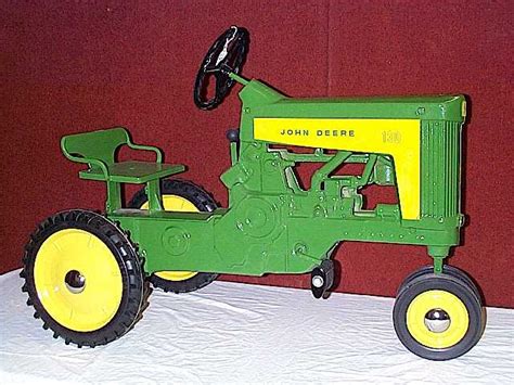 D17 <b>pedal</b> <b>tractor</b>, 34" long x 18" wide x 27" high to top of steering wheel. . Antique pedal tractor parts